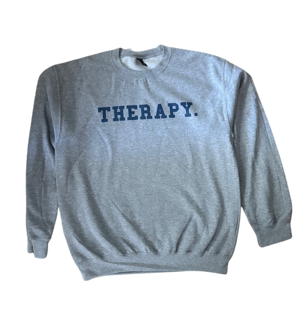 Gray sweatshirt with 'THERAPY.' text on a white background